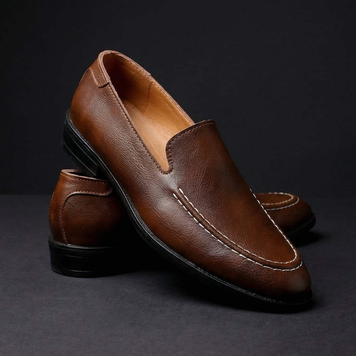 Mocasines hombre efecto piel flexibles pespunteados