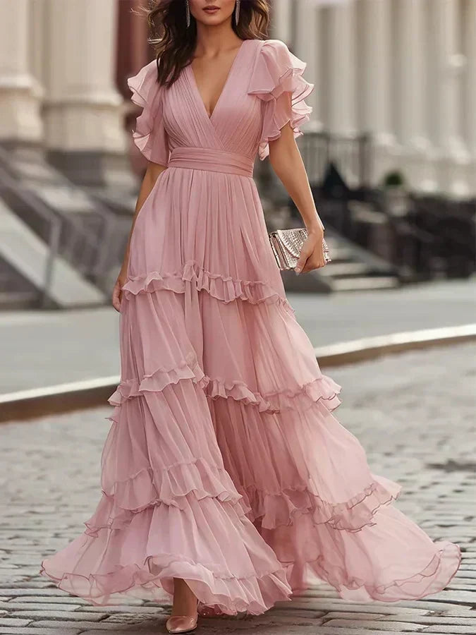 Vestido maxi rosa escote V volantes manga mariposa