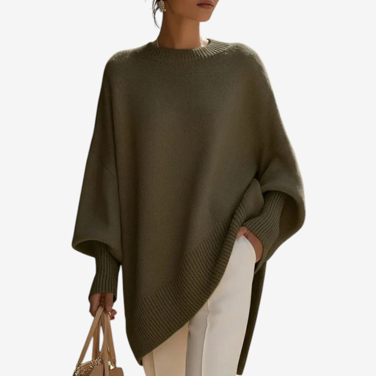 Poncho mujer asimétrico de punto con cuello alto