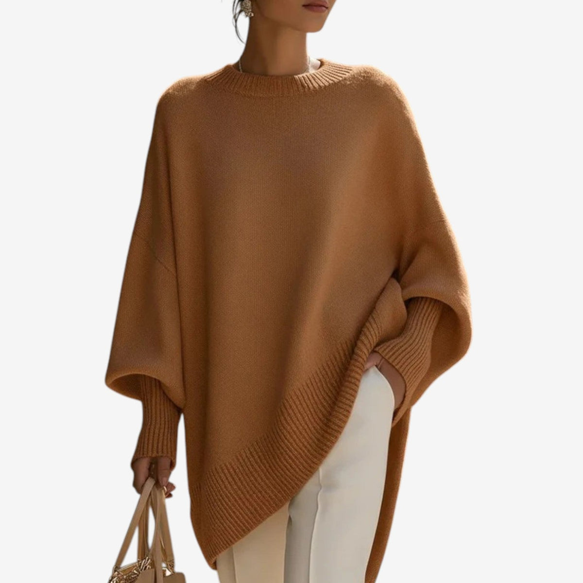 Poncho mujer asimétrico de punto con cuello alto