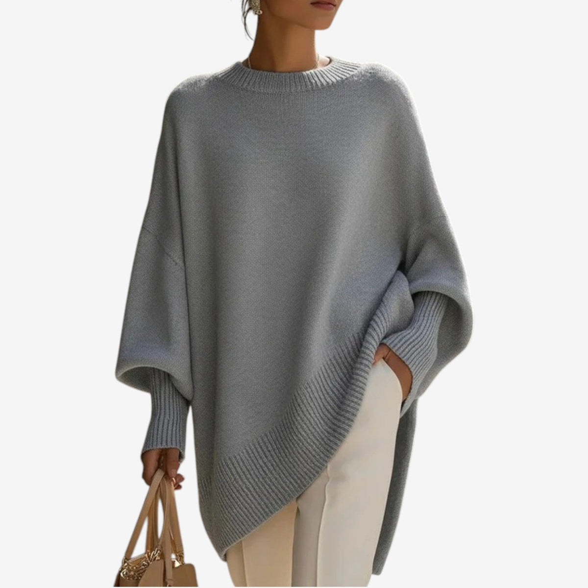 Poncho mujer asimétrico de punto con cuello alto