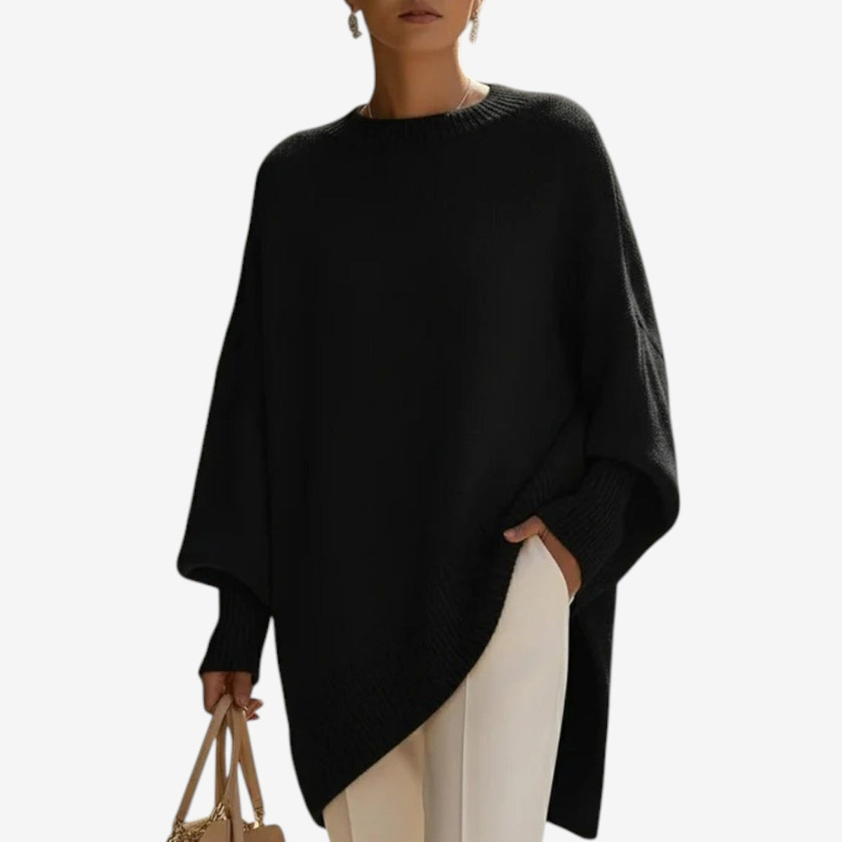 Poncho mujer asimétrico de punto con cuello alto