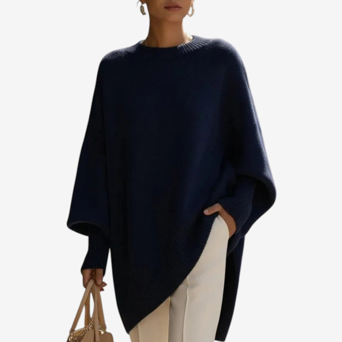 Poncho mujer asimétrico de punto con cuello alto