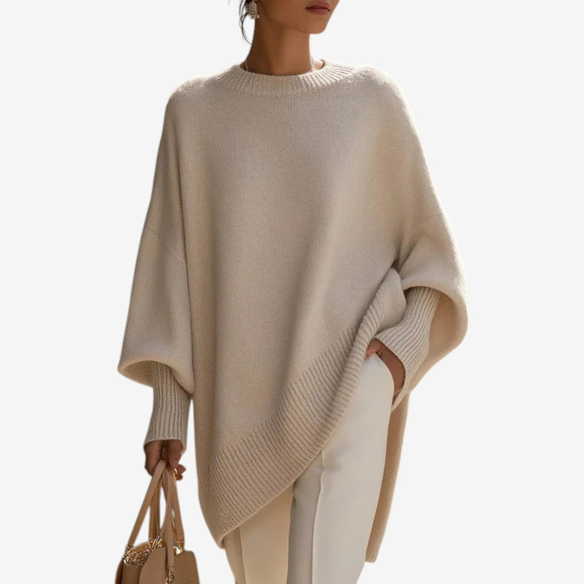 Poncho mujer asimétrico de punto con cuello alto